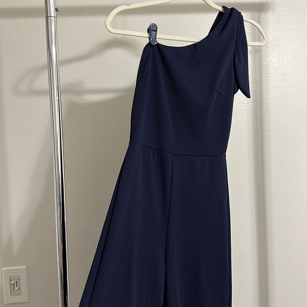 Dark blue one shoulder jumpsuit knot detail on shoulder